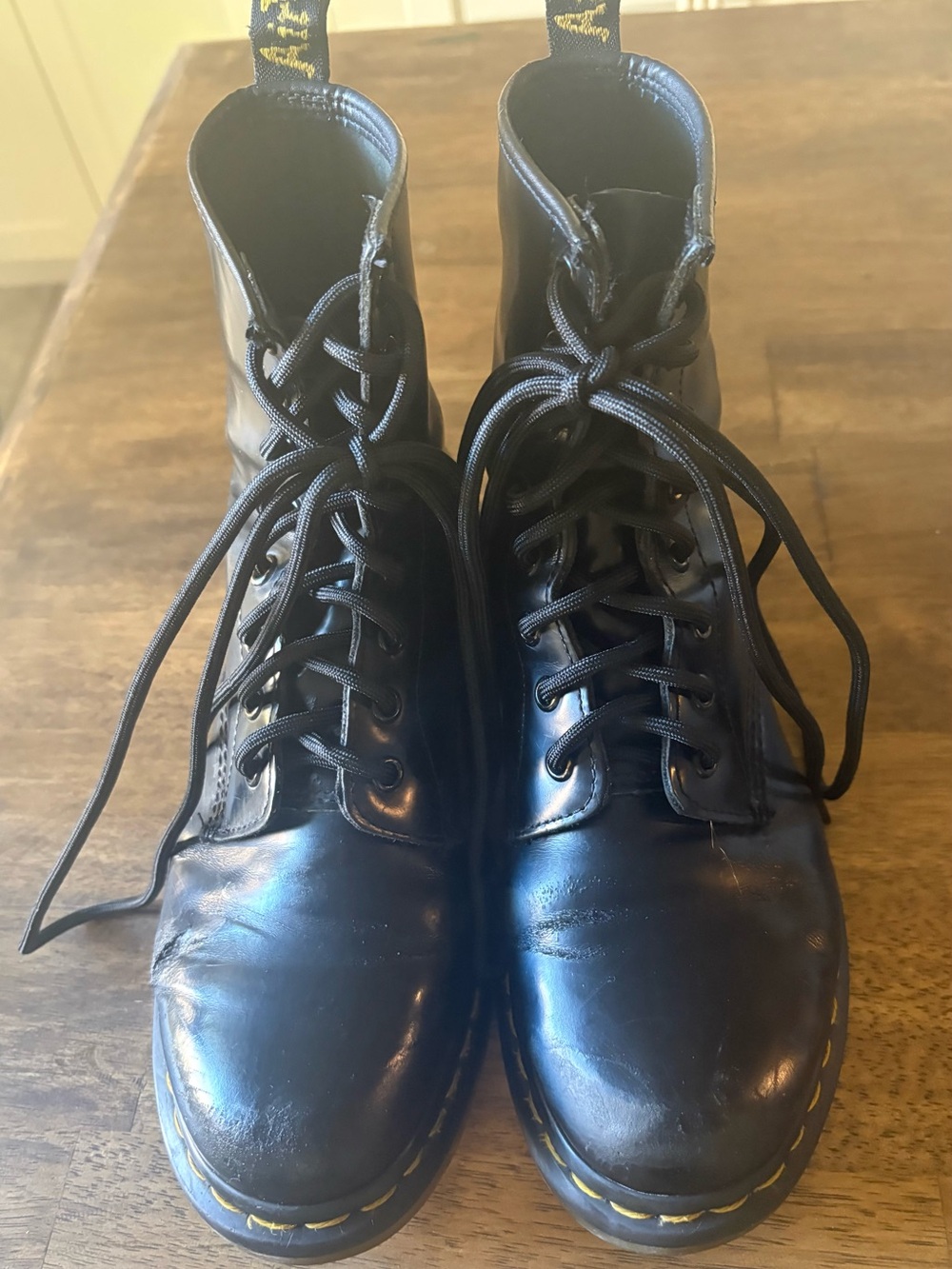 Dr. Martens Black Leather 8-Eye Lace-Up Boots with Yellow Stitching